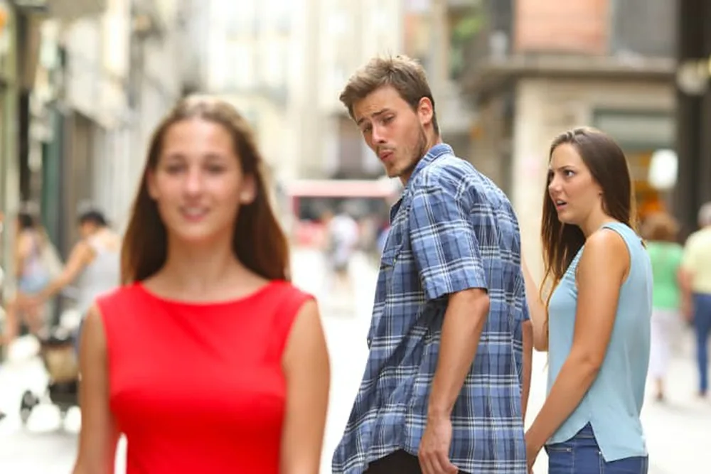 Distracted Boyfriend meme: whichever joke is listed second; Jev; the joke with more upvotes